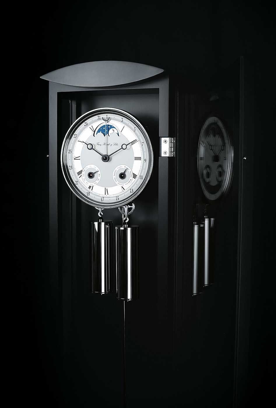 Hermle Wanduhr 78,5x22x11,5 cm Holz • Mechanisches Uhrwerk • Ewiger Kalender