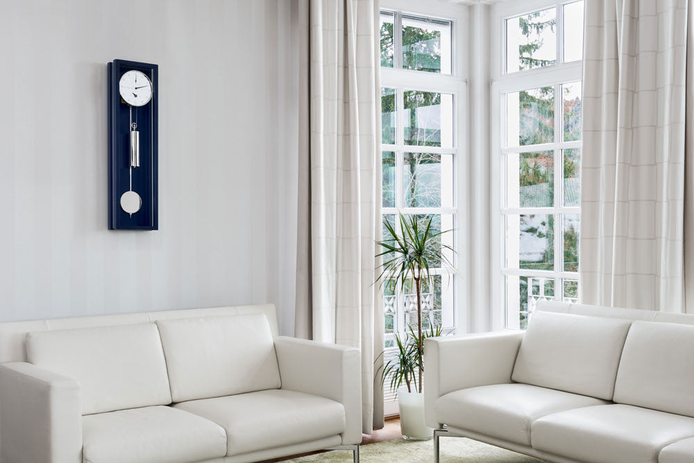 Hermle Wanduhr 86x23x13 cm Holz • 31 Tage Gangreserve • Sichtbares Uhrwerk