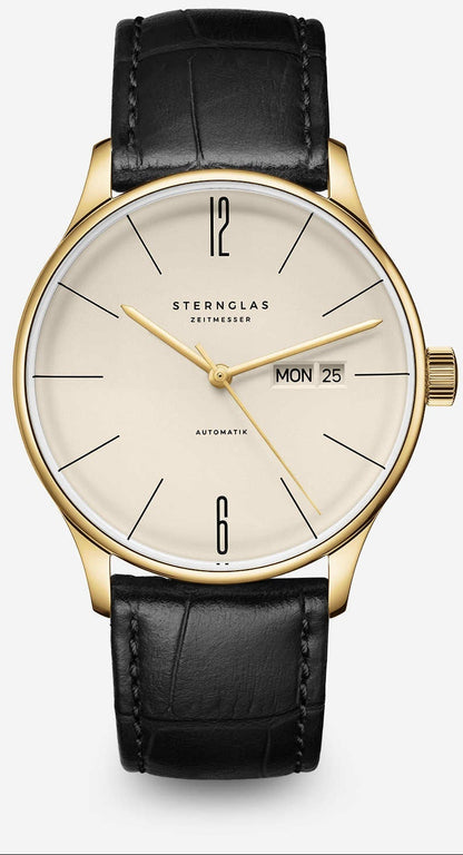 https://cdn.shopify.com/s/files/1/2384/2637/files/S02-BE14-HE03_BerlinAutomatiksepiagold_Heritage20schwarz_frontal_grau.jpg?v=1771864952
