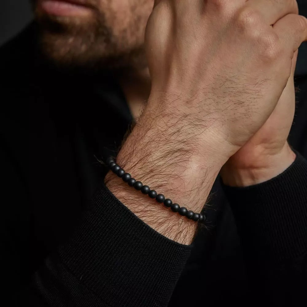 Armband aus 6mm schwarzen Naturstein mit schwarzem Edelstahlverschluss - Rebel&Rose Modell: RR-60089-B-M