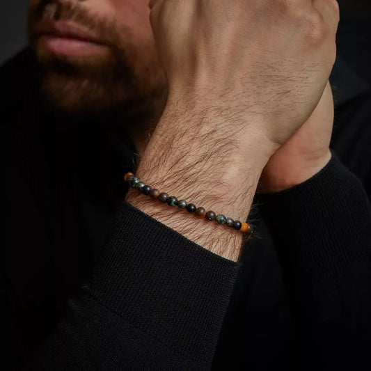 Armband aus 6mm Brekzien-Jaspis, gelbem Tigerauge, blauem Tigerauge, Ryolith und grauem Hämatit Edelsteinen mit grauem Edelstahlverschluss - Rebel&Rose Modell: RR-60128-V-S